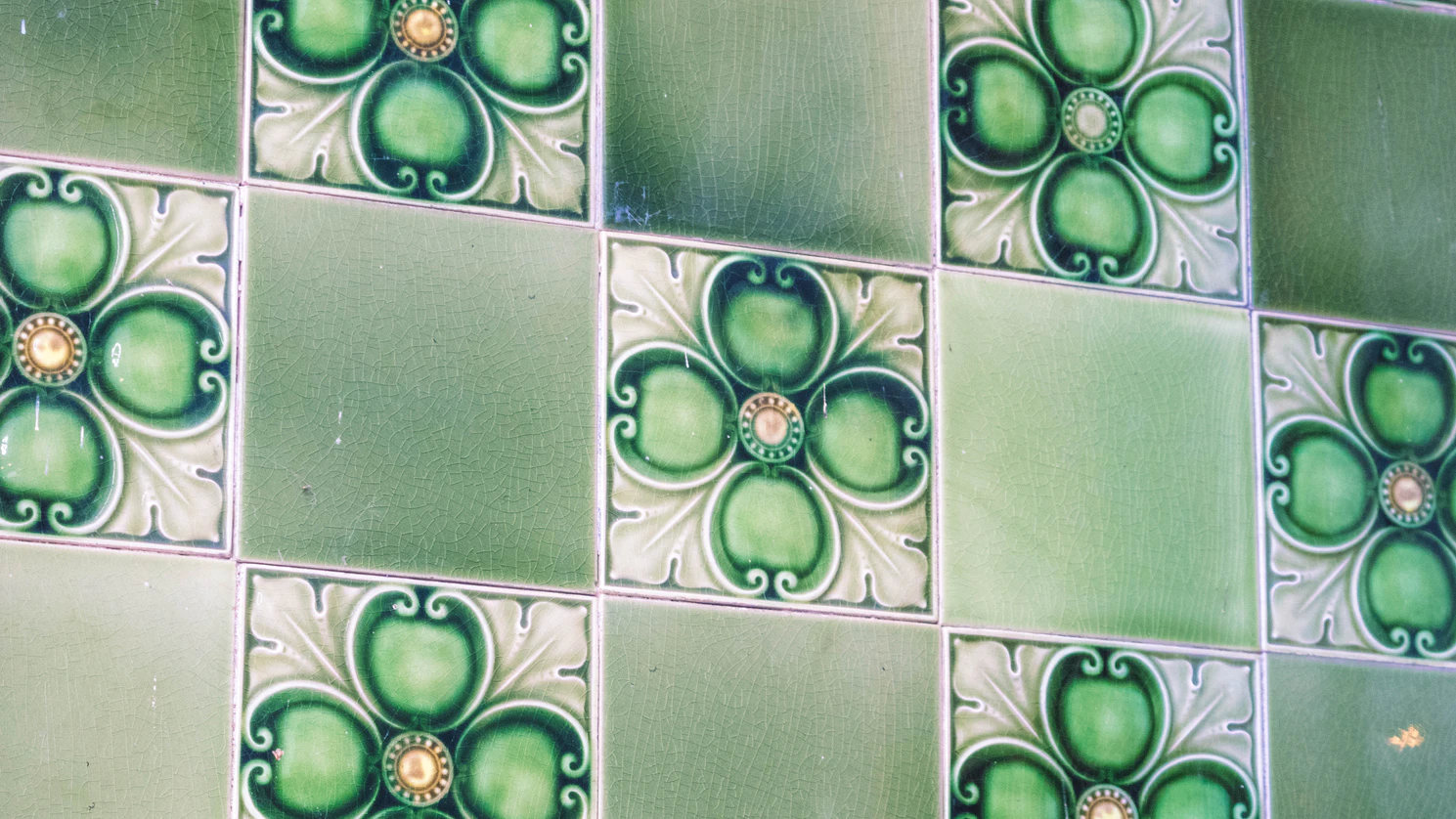 high quality photo of green and creme floral bathroom tiles
