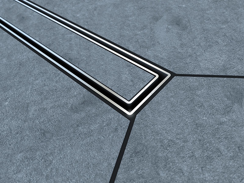textured grey bathroom floor tiles with a lineal drain